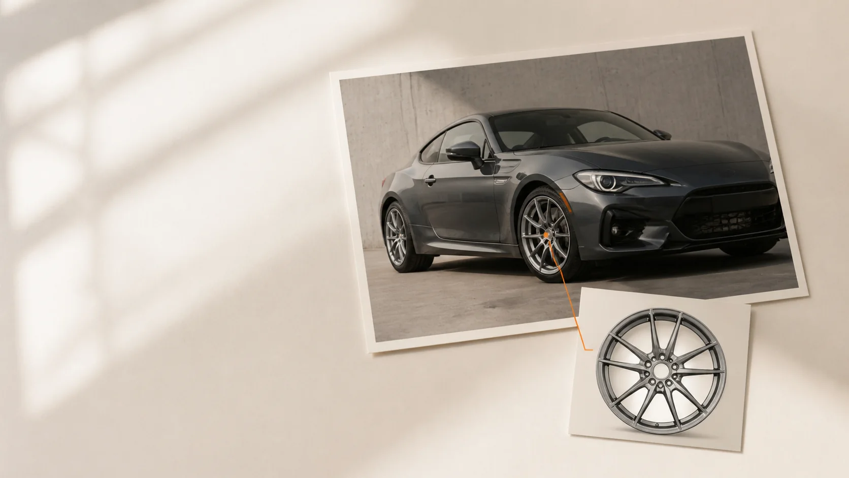 Editorial view of a car photo and wheel reference connected by an orange alignment line